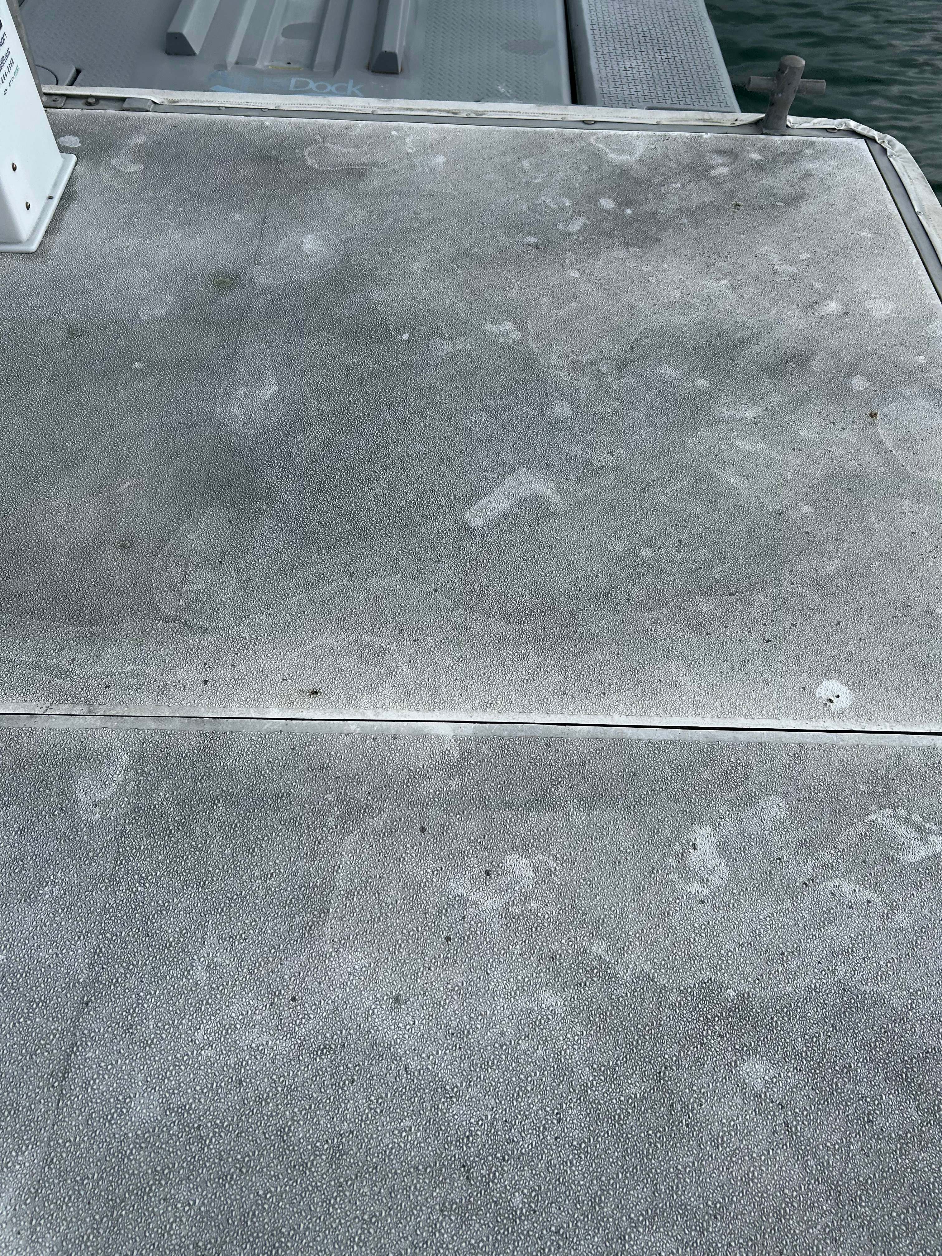 Clean grey pontoon decking surface